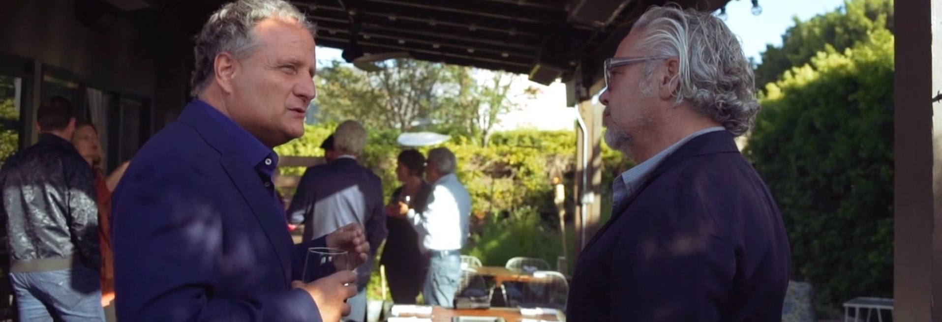 Men Standing Around Outside BBQ Grill