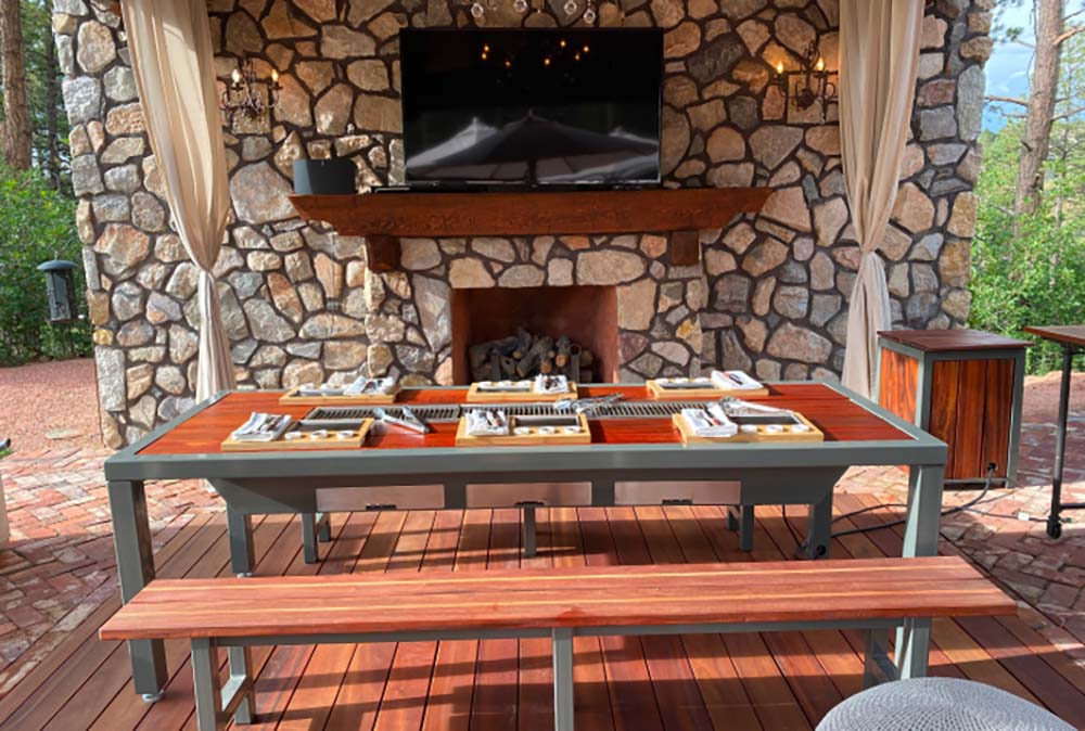 outdoor dining table with bbq grill