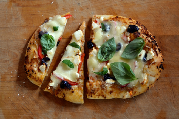 Pizza Grilled on Outdoor BBQ Grill